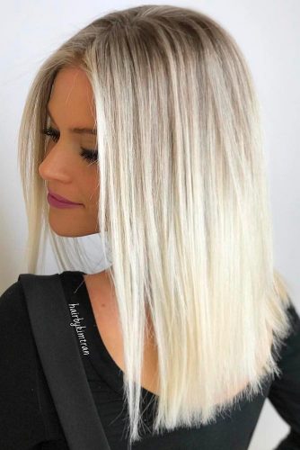 Blonde shoulder clearance length hair straight