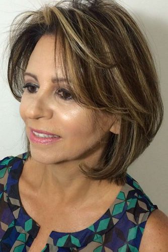 Medium Layered Haircut with Highlights