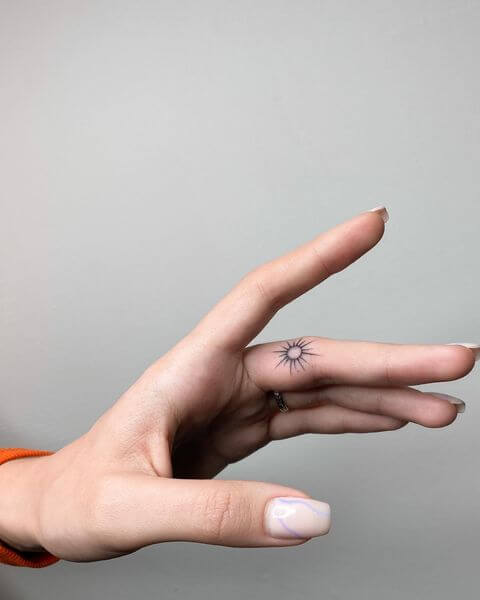 Sun And Moon Finger Tattoos