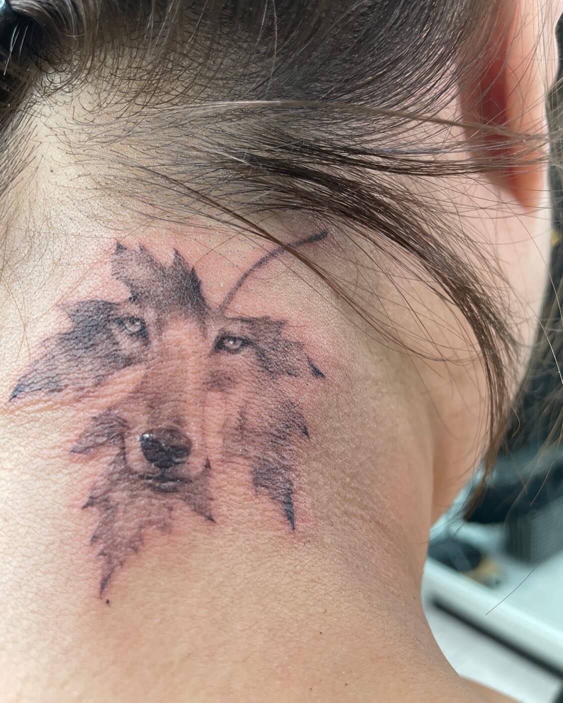 Wolf Neck Tattoo