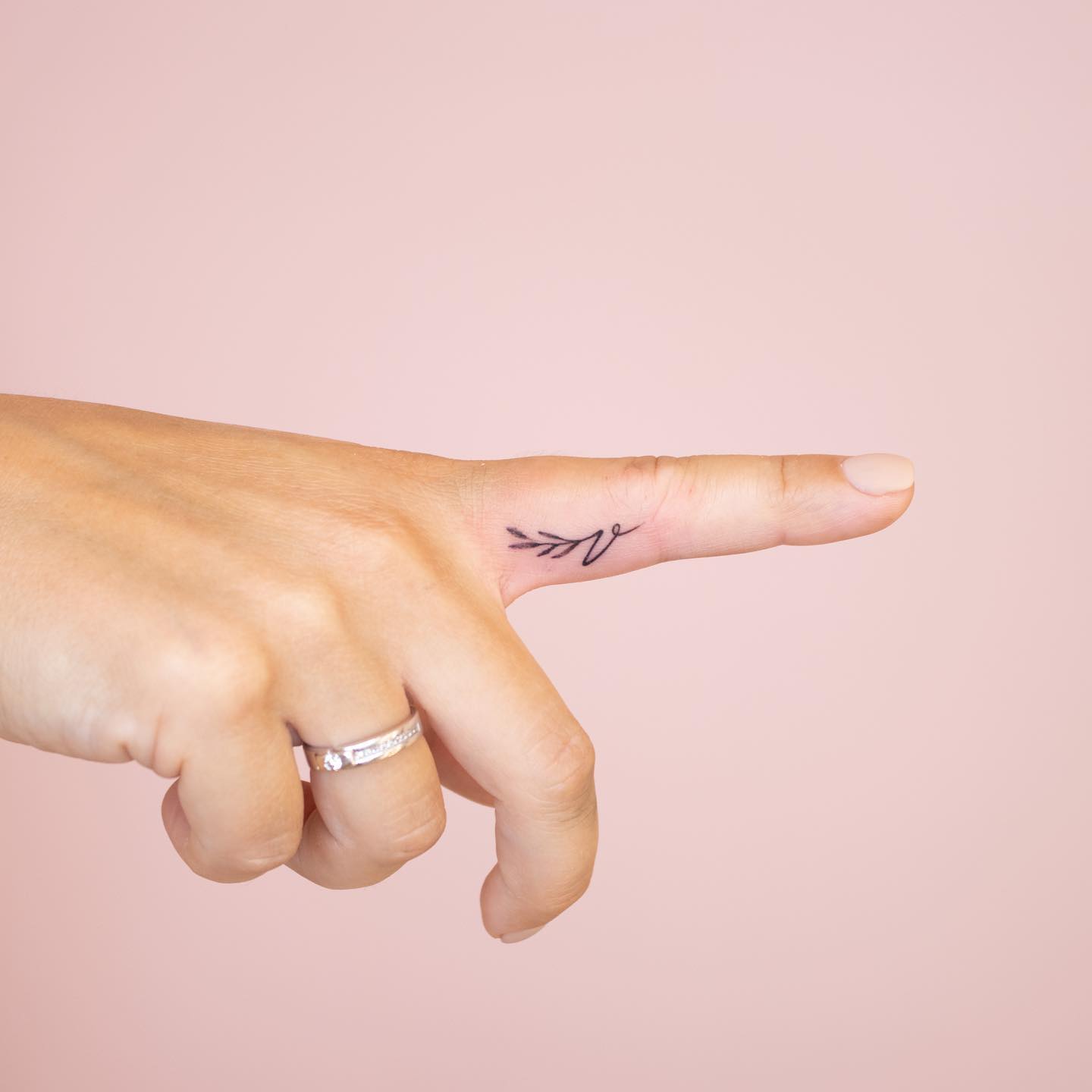 Tattoo Letters On Fingers