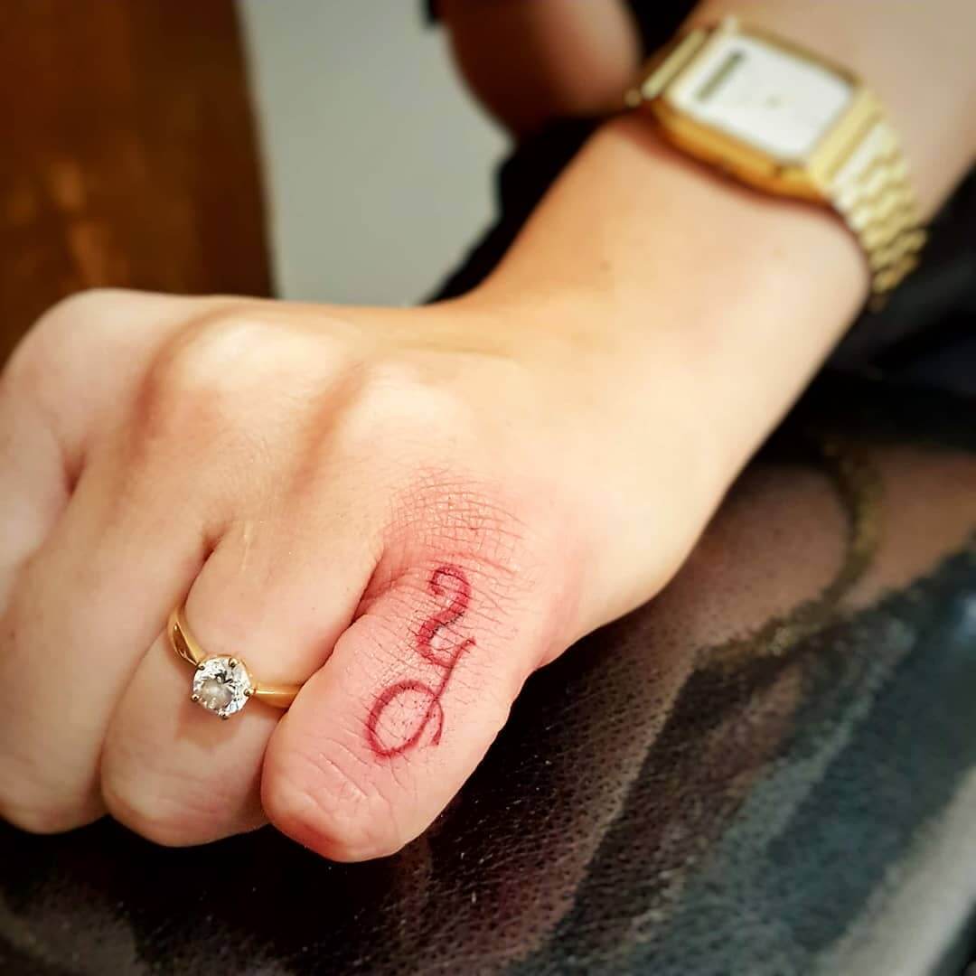 Tattoo Letters On Fingers