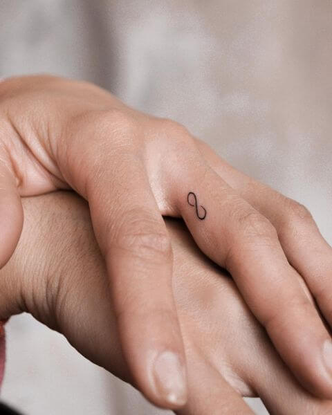 Tiny Finger Tattoos