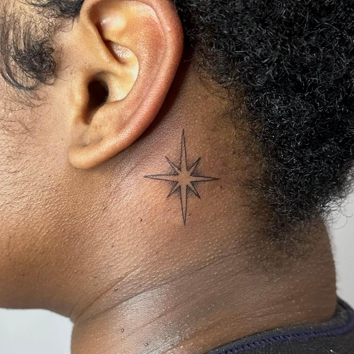 Stars Behind Ear Tattoo