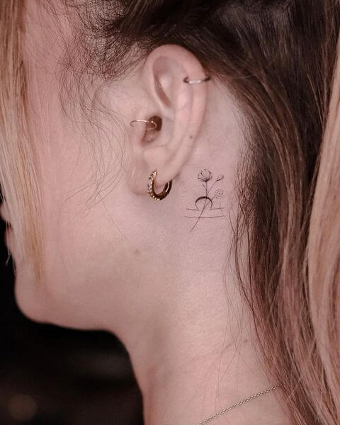 Behind The Ear Flowers Tattoo