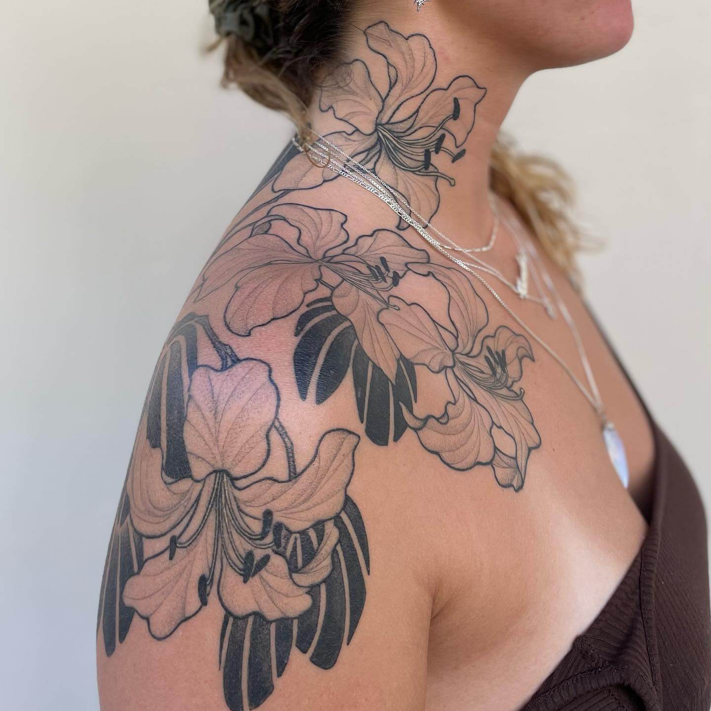 Shoulder and Neck Tattoo