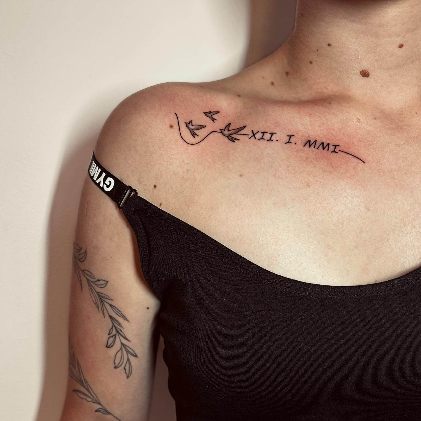 Collarbone Tattoos Roman Numerals