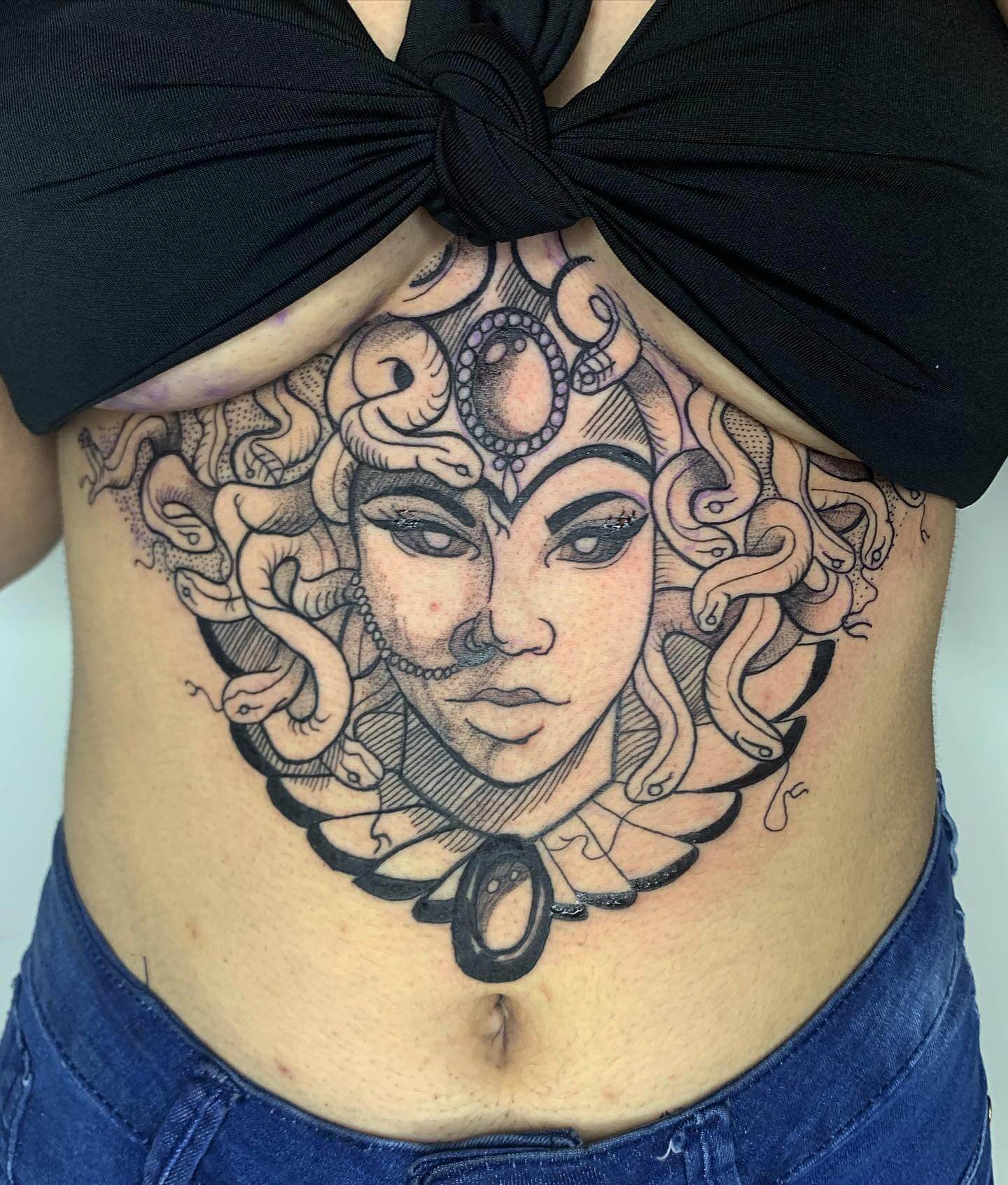 Medusa Sternum Tattoos