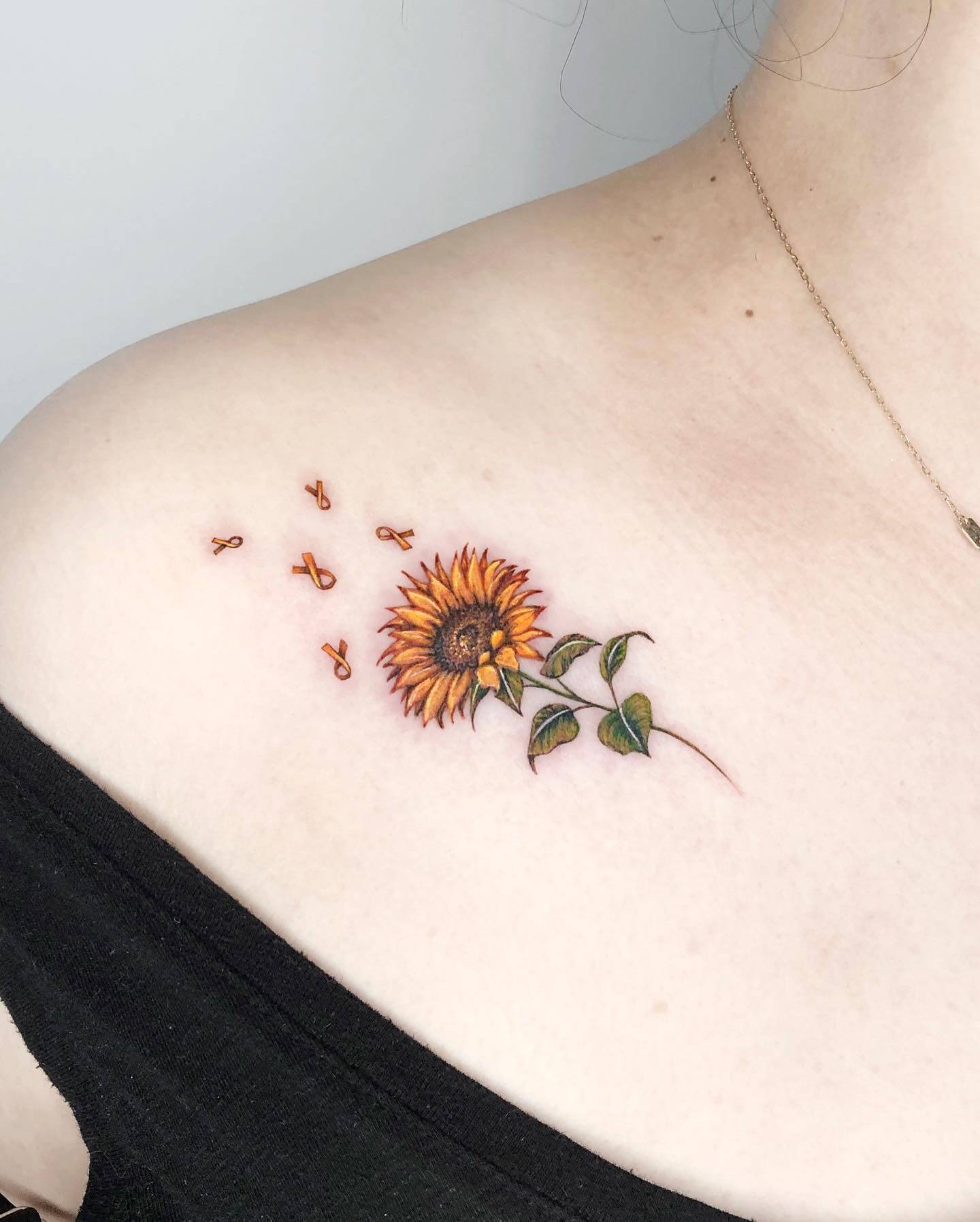 Sunflower Collarbone Tattoo